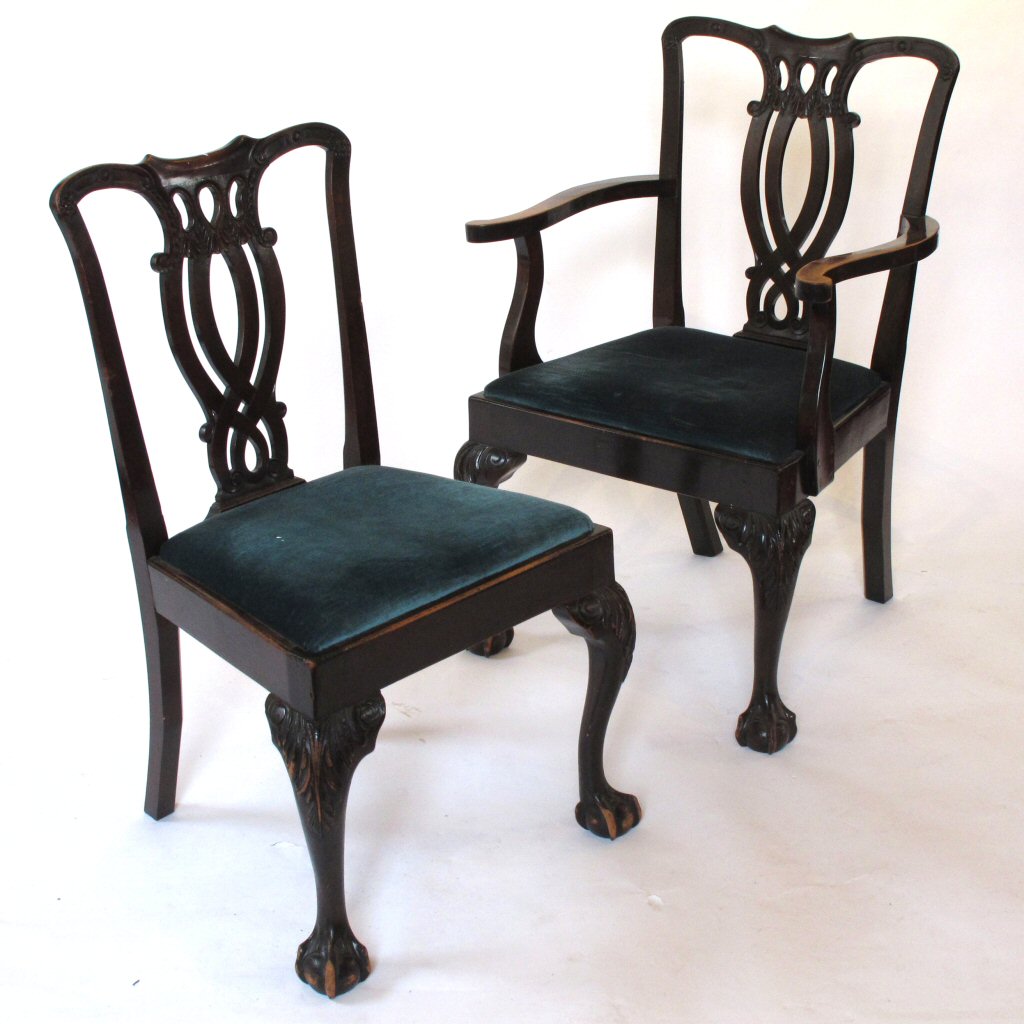 A set of eight Chippendale style mahogany dining chairs