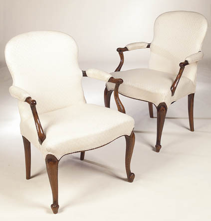 A pair of Hepplewhite style mahogany open armchairs,