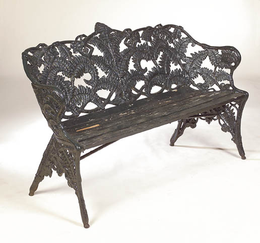 A Coalbrookdale style fern and berry pattern cast iron garden bench,