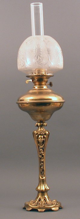 An Art Nouveau brass oil lamp