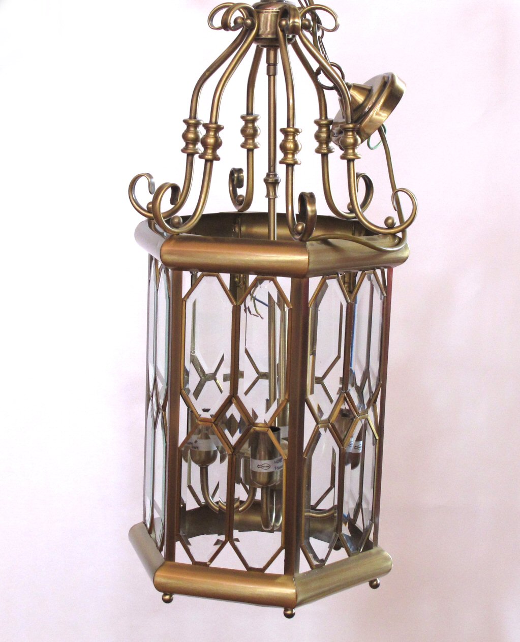 A pair of 20th century hexagonal lacquered metal hall lanterns