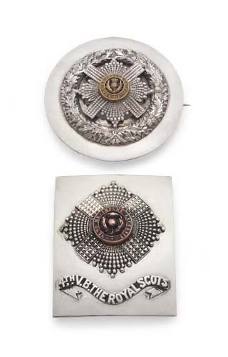 A regimental belt buckle,