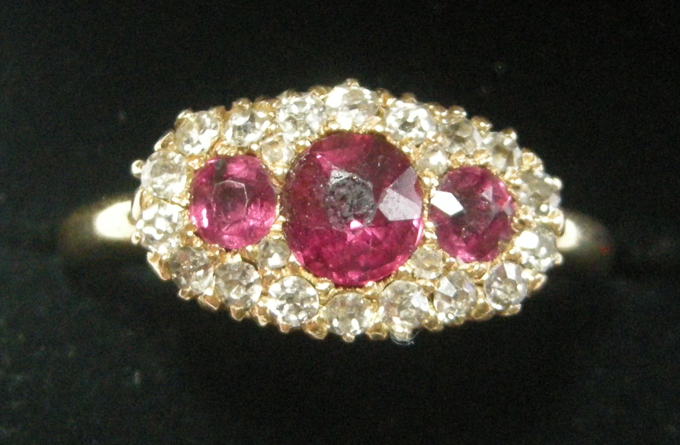An attractive 18ct gold, ruby and diamond ring