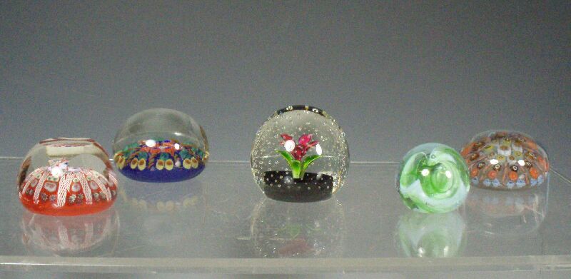 A collection of paperweights