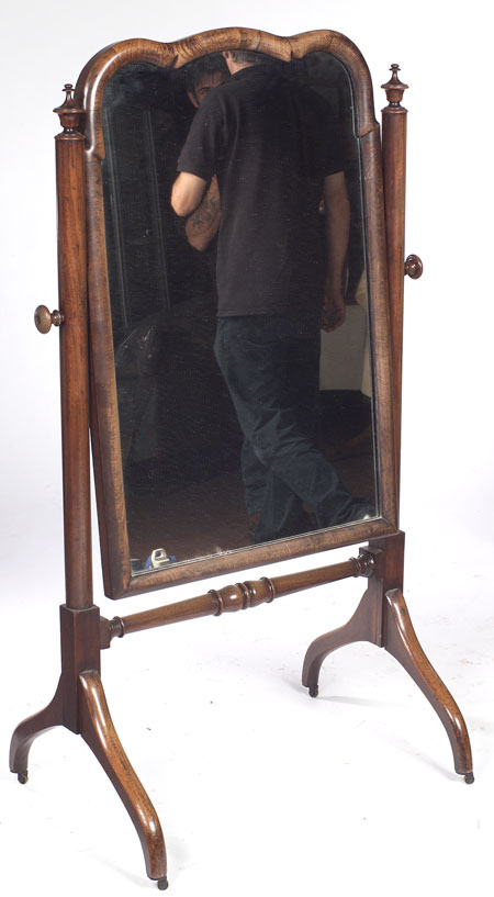 A Victorian mahogany cheval mirror
