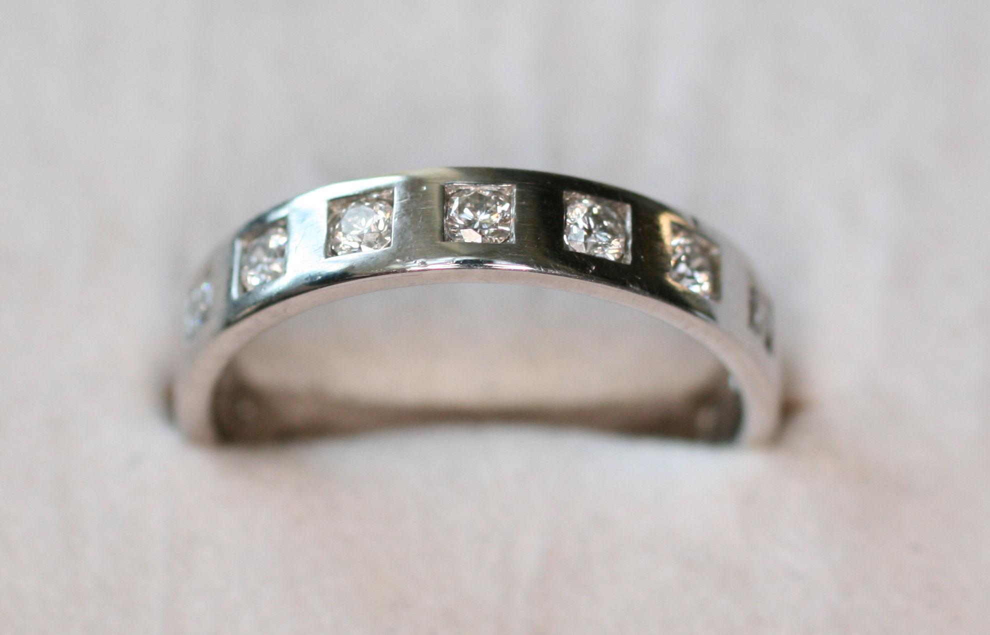 A diamond set 18ct white gold eternity ring