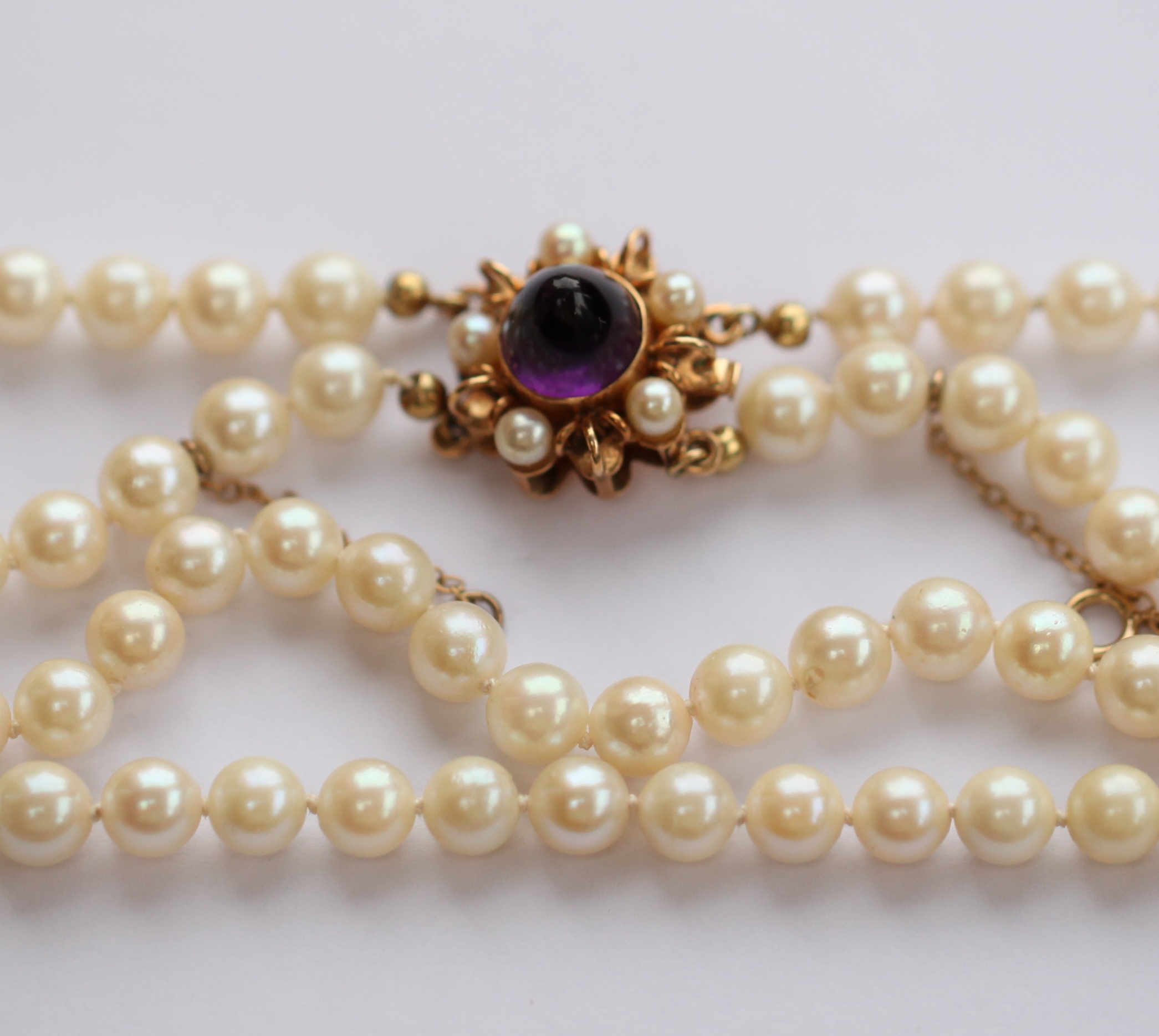 A two-row cultured pearl necklace
