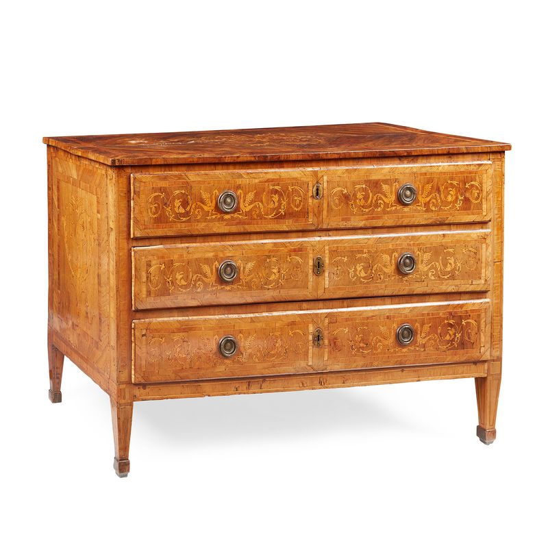 AN ITALIAN WALNUT AND OLIVEWOOD MARQUETRY COMMODE