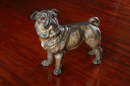 A late 19th/early 20th century Austrian painted terracotta model of a pug
