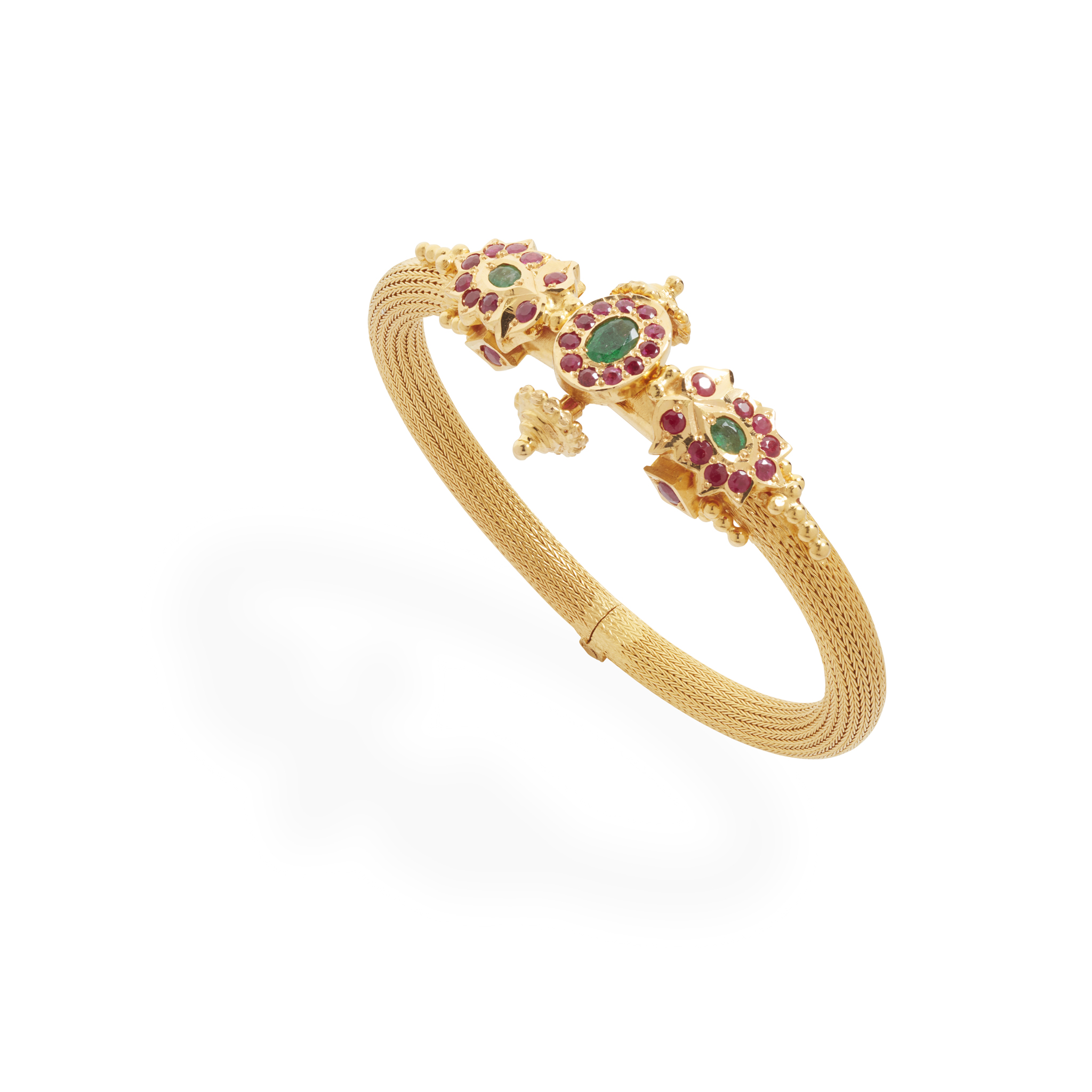An emerald and ruby bangle