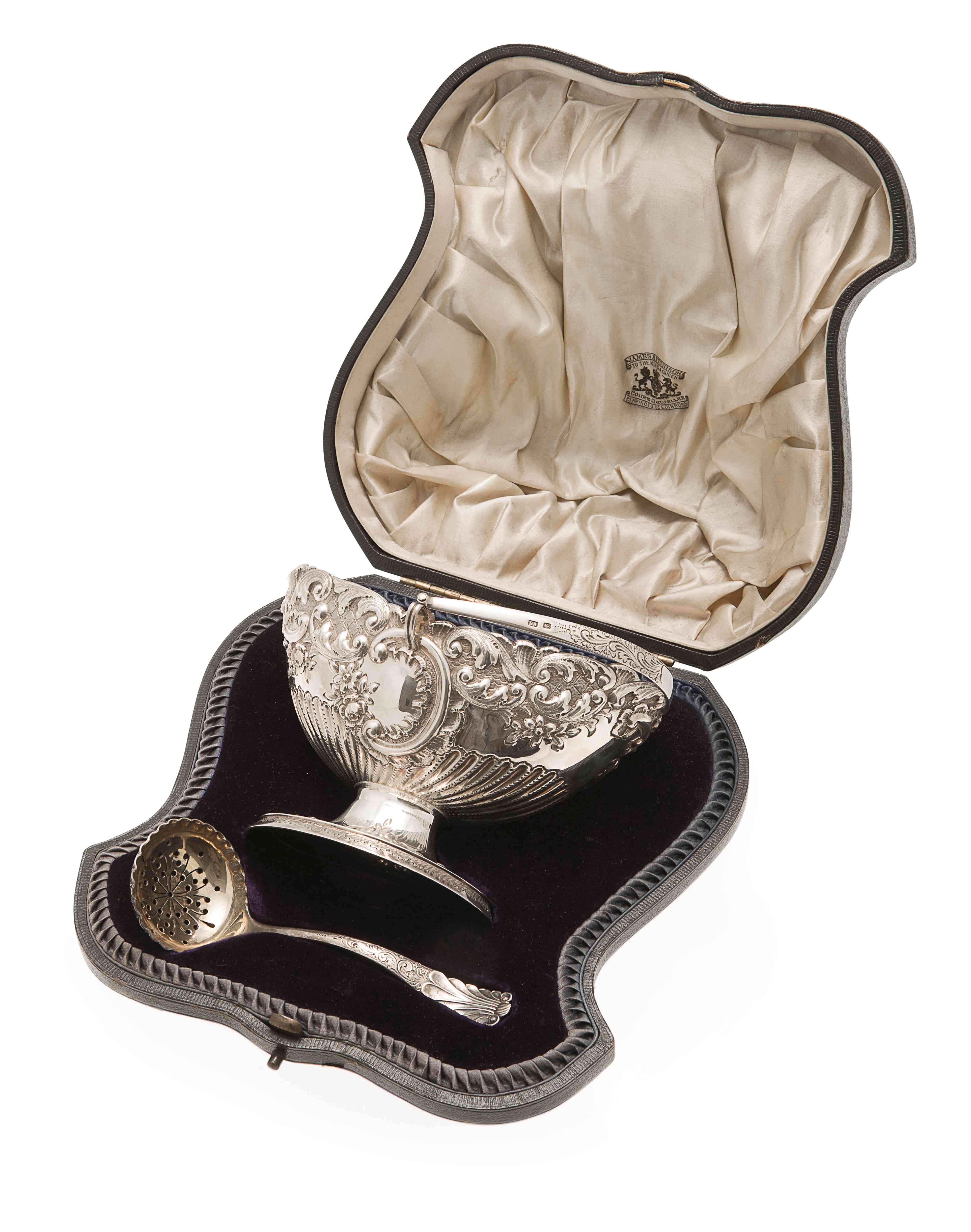 A cased Edwardian sugar bowl and sifter