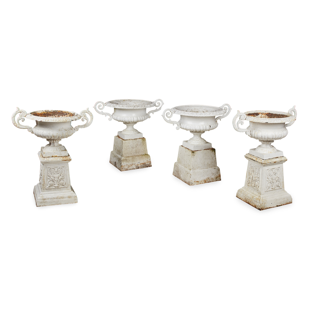 TWO PAIRS OF WHITE PAINTED CAST IRON URNS AND STANDS