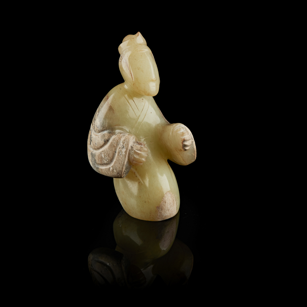 YELLOW JADE FIGURE OF A KNEELING COURT LADY