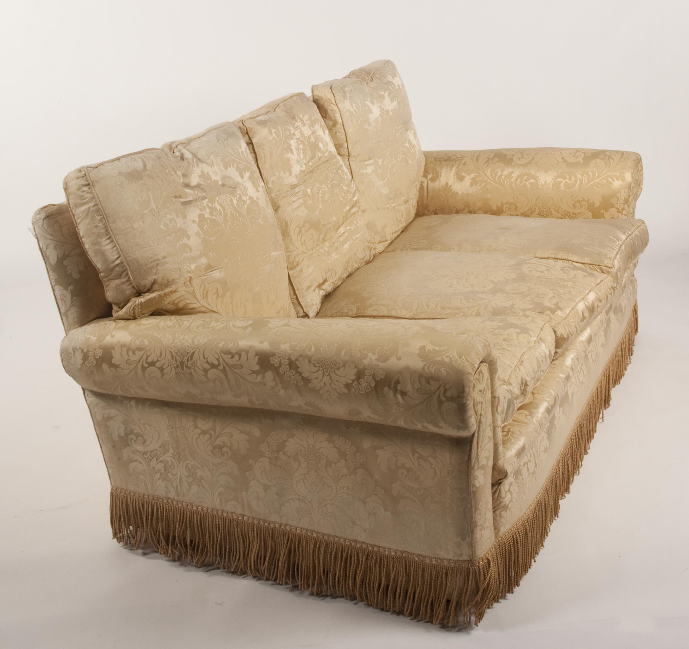 A pair of gold damask settees