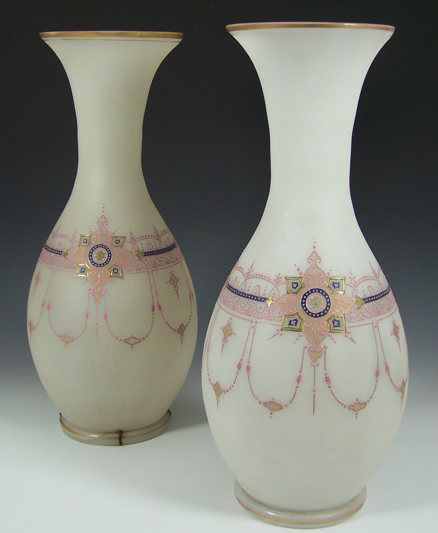 A large pair of late 19th century Bohemian white glass vases,