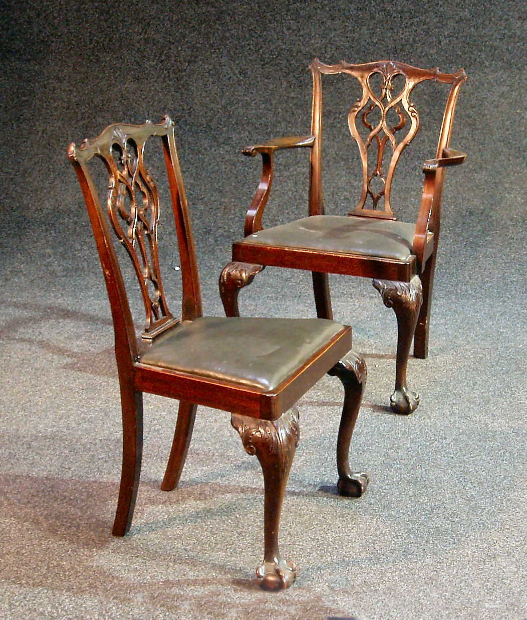 A set of eight George III style mahogany dining chairs,