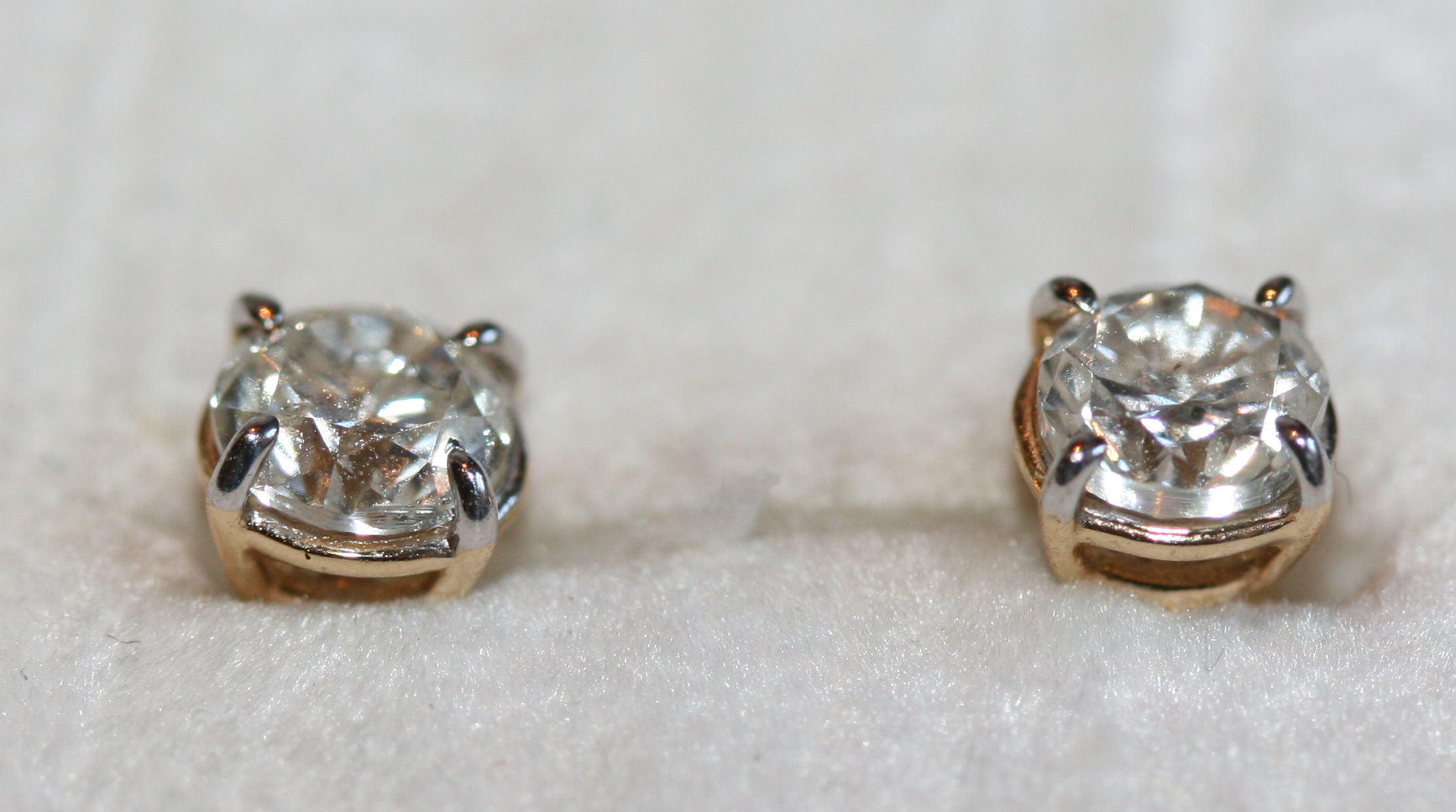 A pair of diamond ear studs