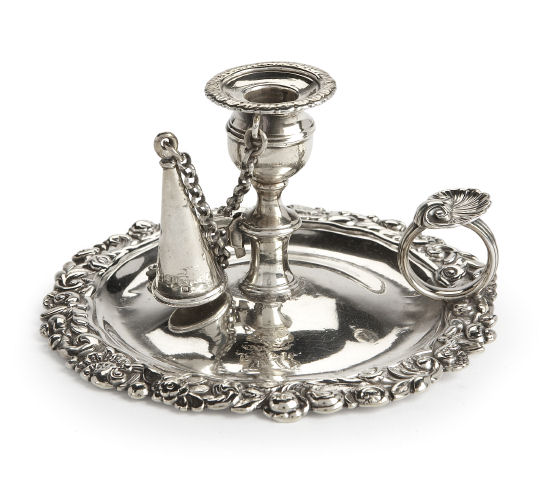 A George IV silver taper chamber stick