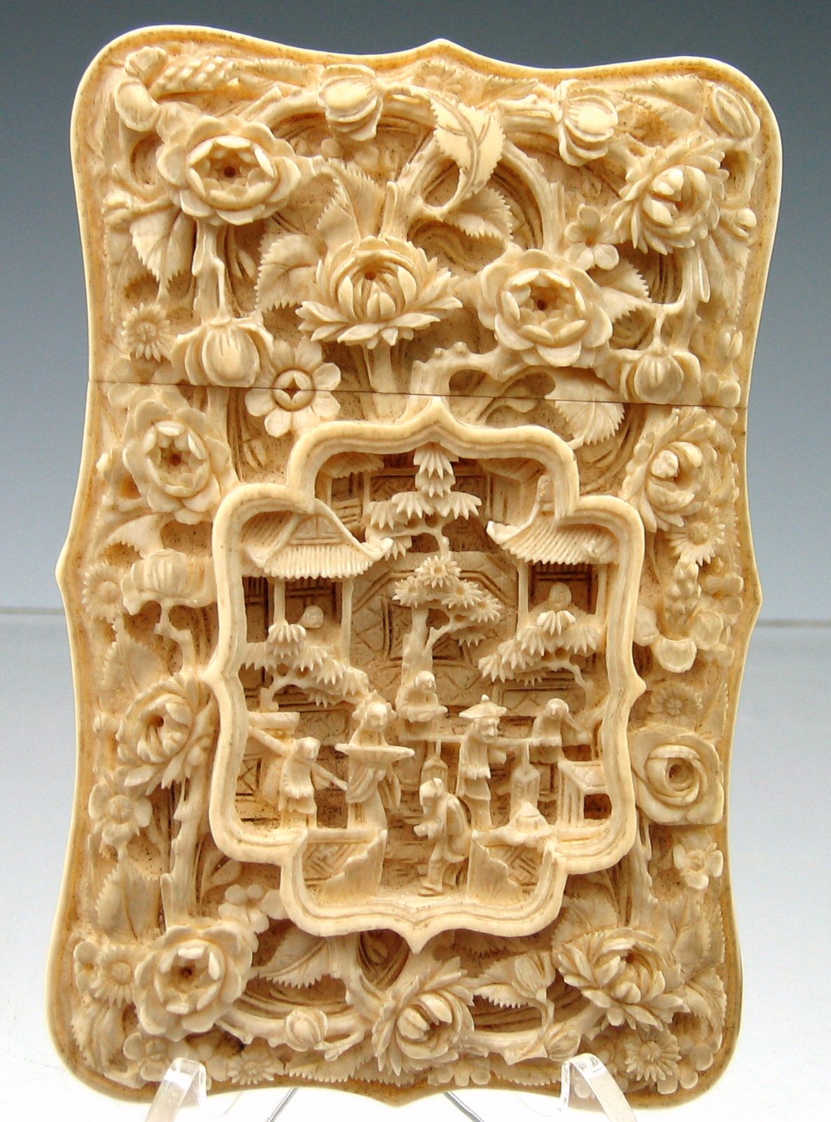 A carved Canton ivory card case, 19th century,