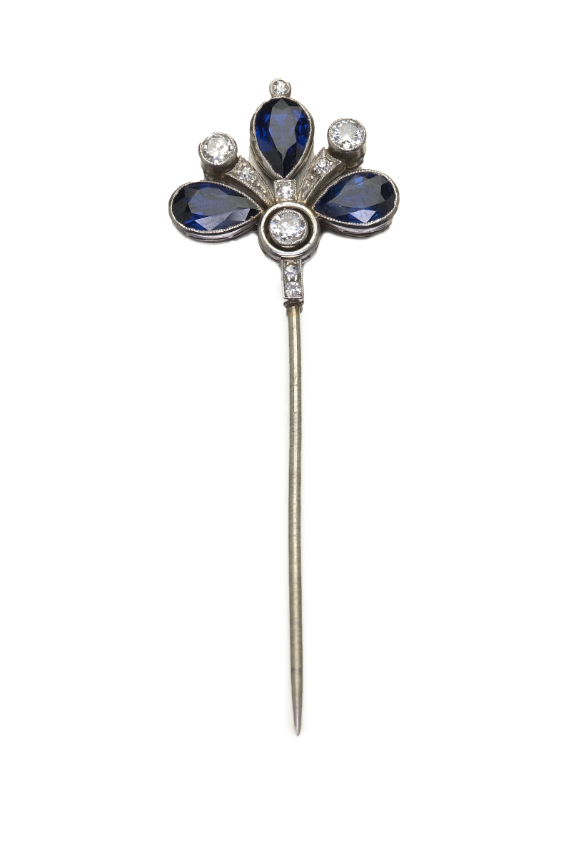 A sapphire and diamond set jabot pin