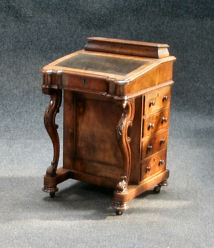 A Victorian walnut davenport