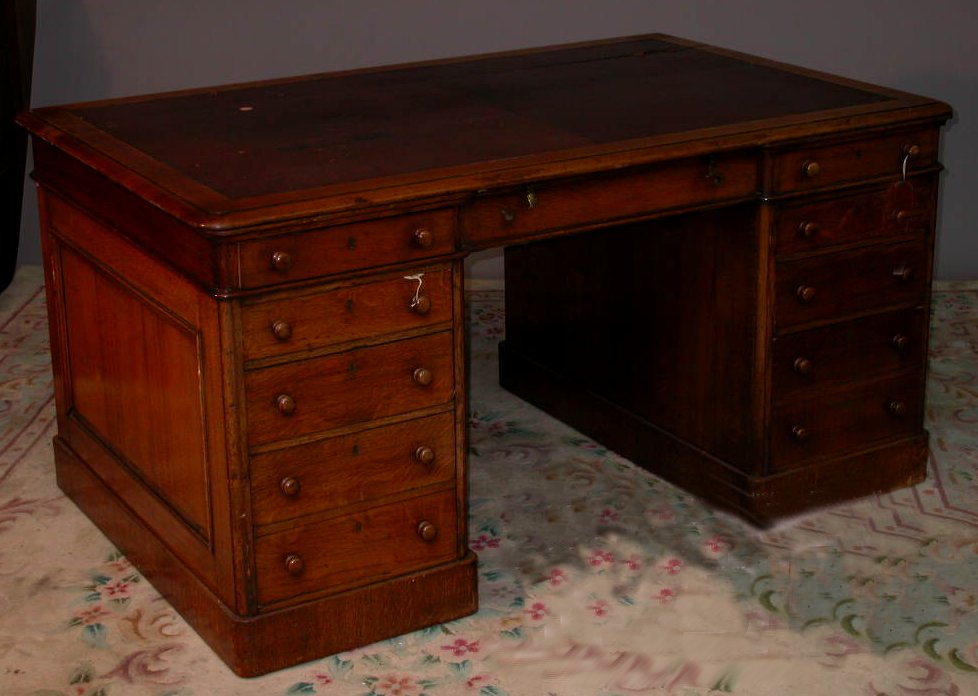 A Victorian oak partners desk