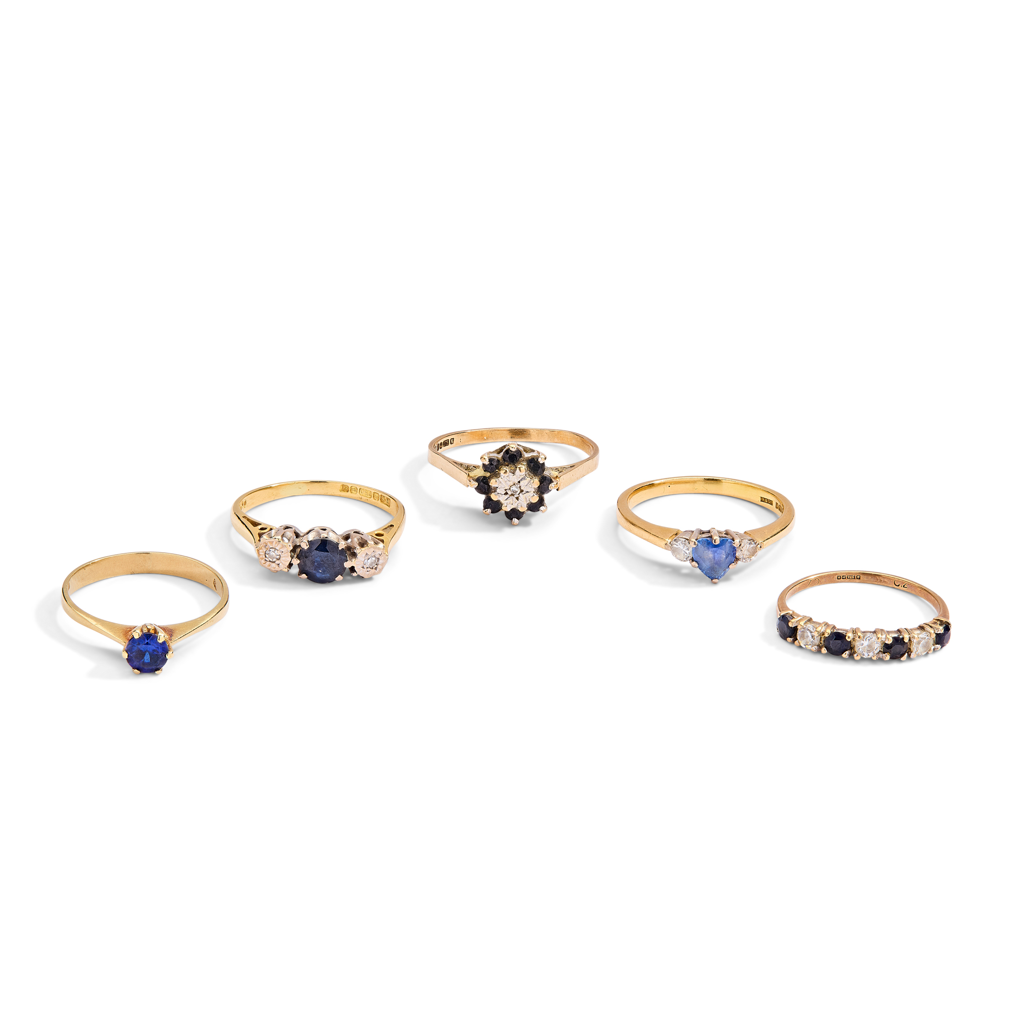 A collection of sapphire and diamond rings