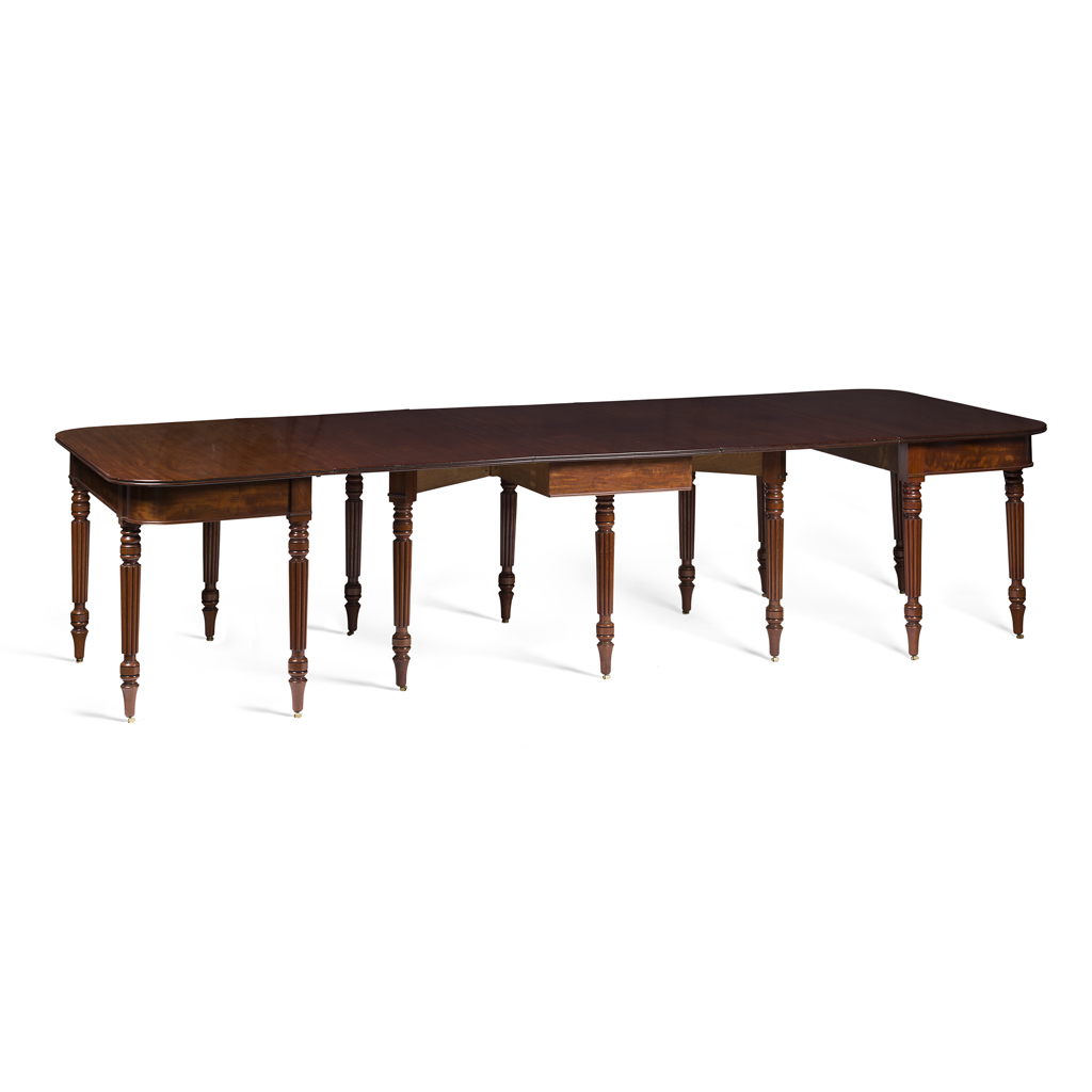 FINE REGENCY MAHOGANY DINING TABLE IN THE MANNER OF GILLOWS