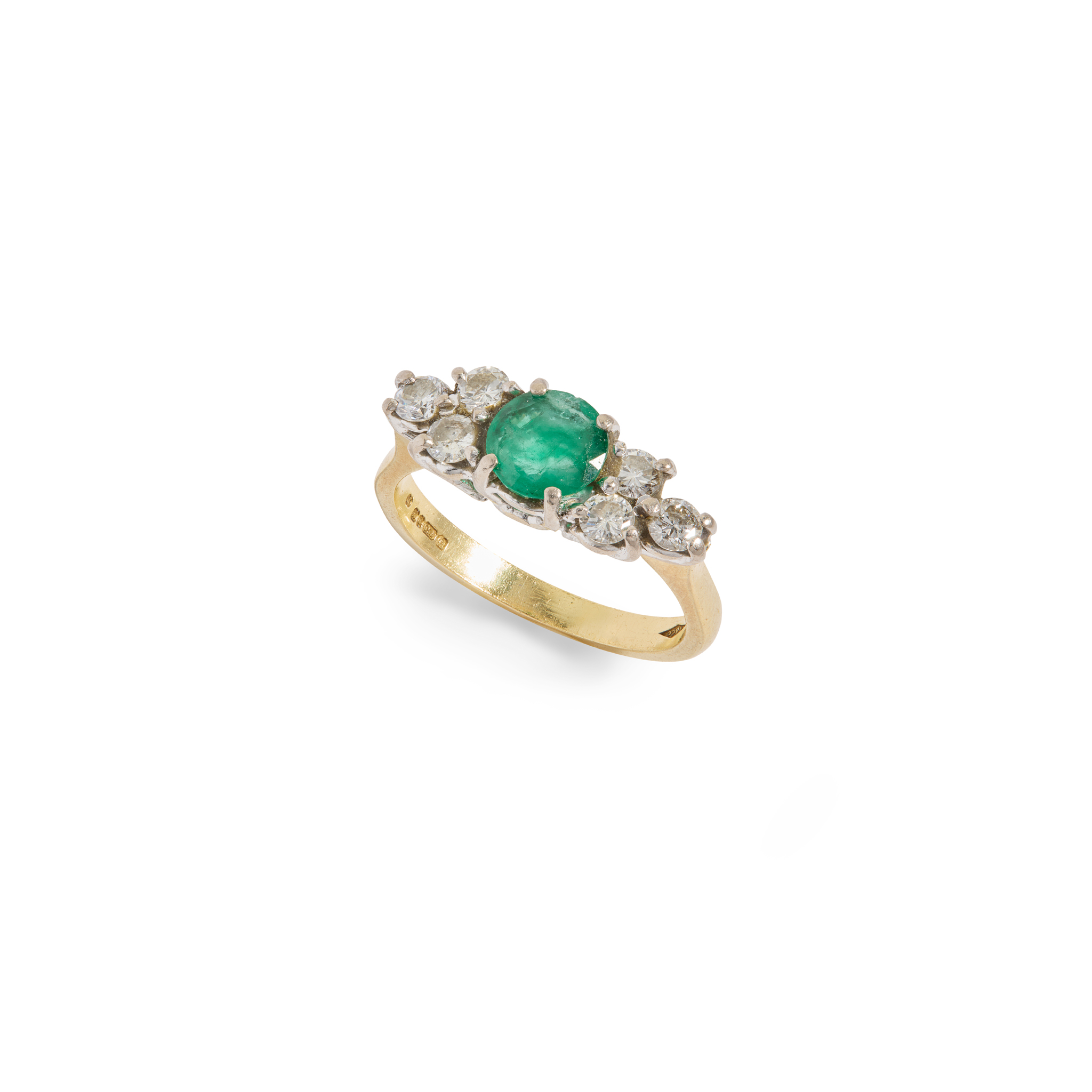 An 18ct gold emerald and diamond ring