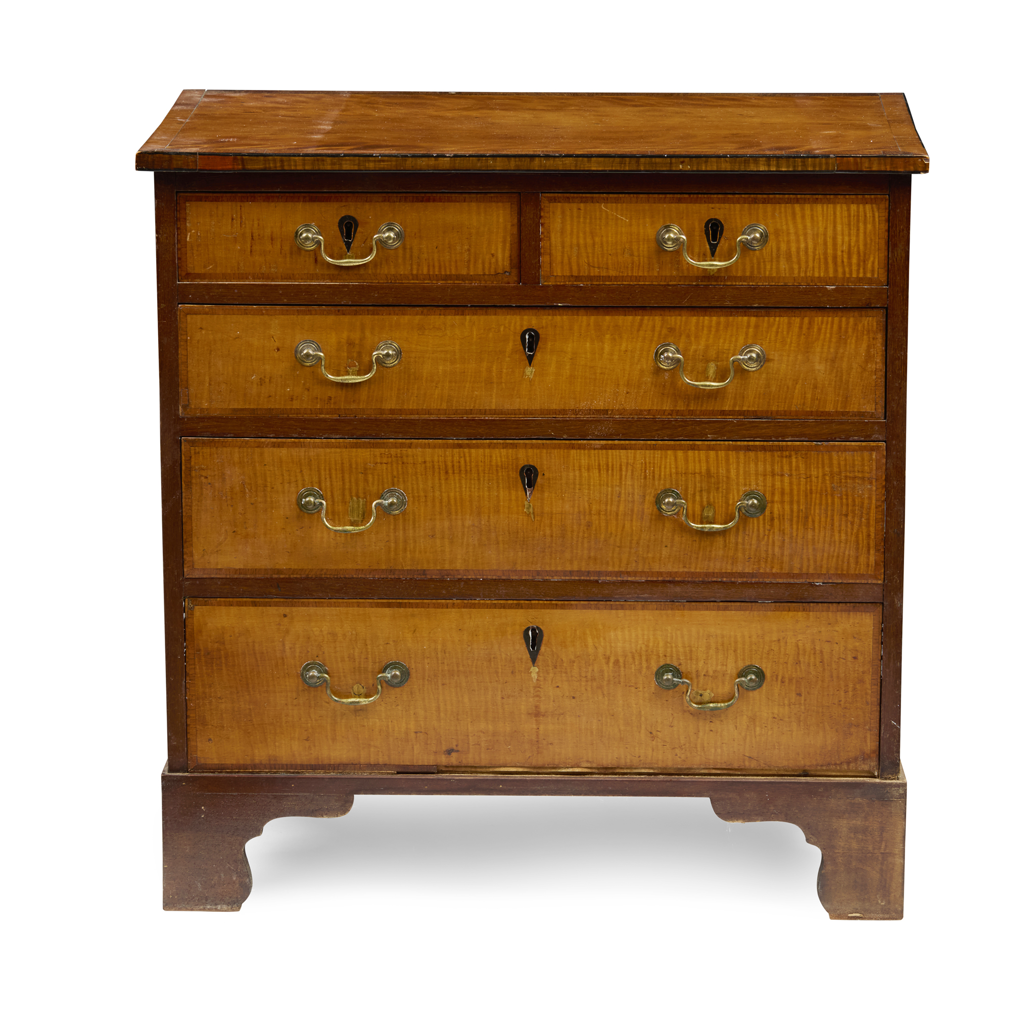 LATE GEORGE III SMALL SATINWOOD, MAHOGANY, AND EBONY CHEST OF DRAWERS