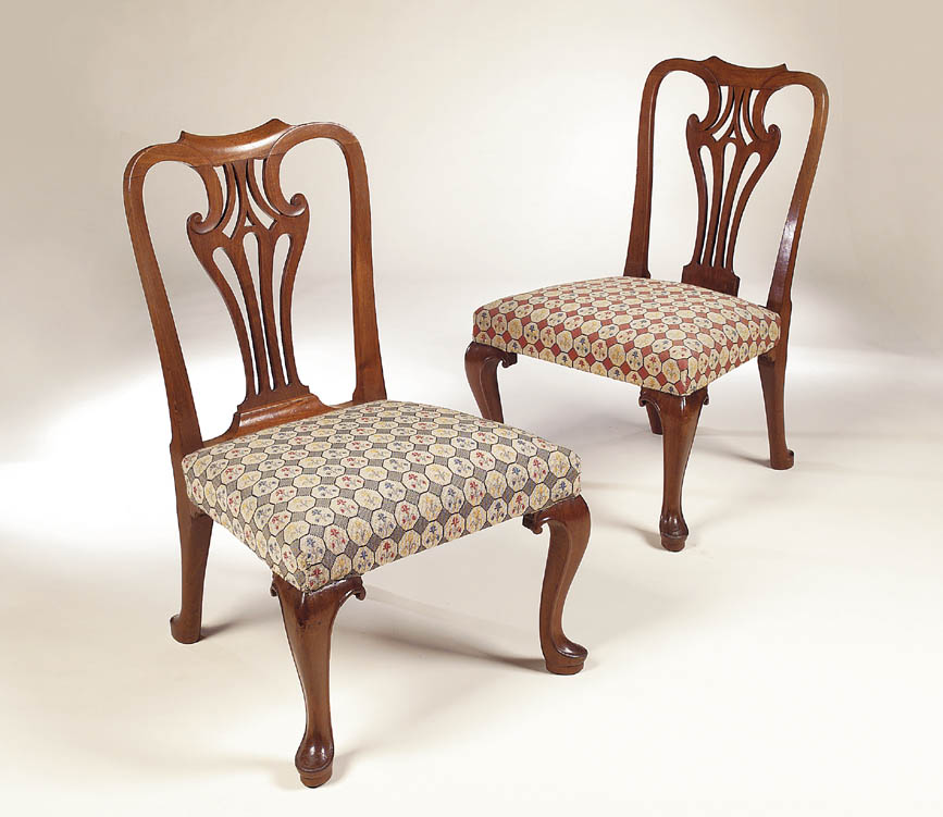 A pair of 19th century mahogany George III style dining chairs,