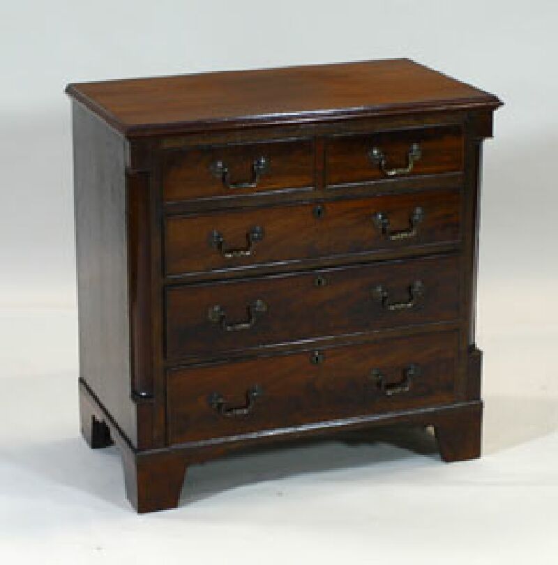 A small Edwardian mahogany chest