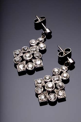 A pair of diamond pendant earrings,