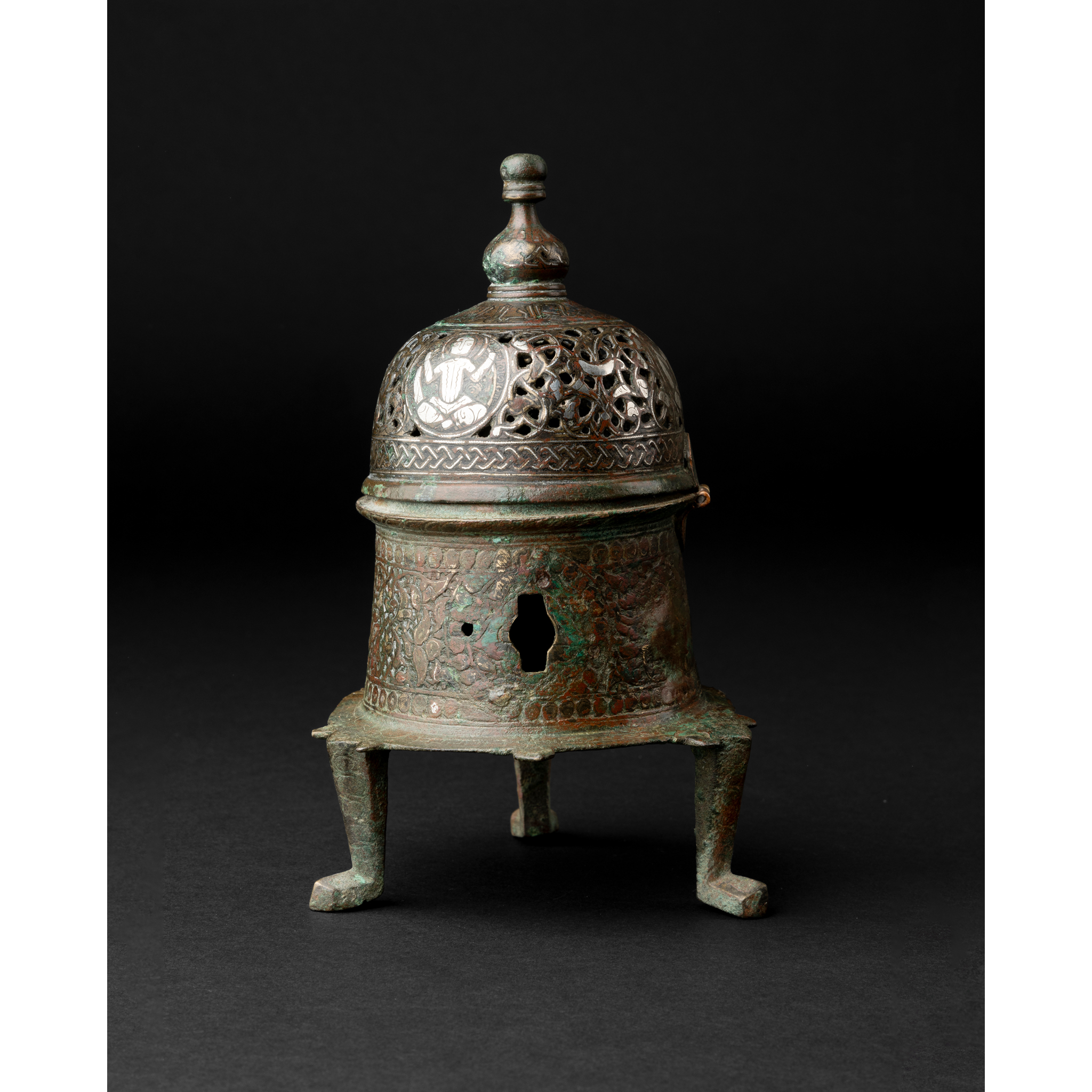 A KHORASAN SILVER INLAID BRONZE INCENSE BURNER