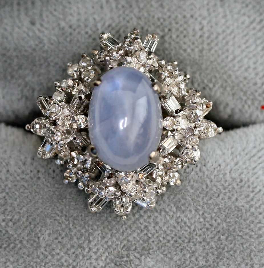 A star sapphire and diamond cluster ring