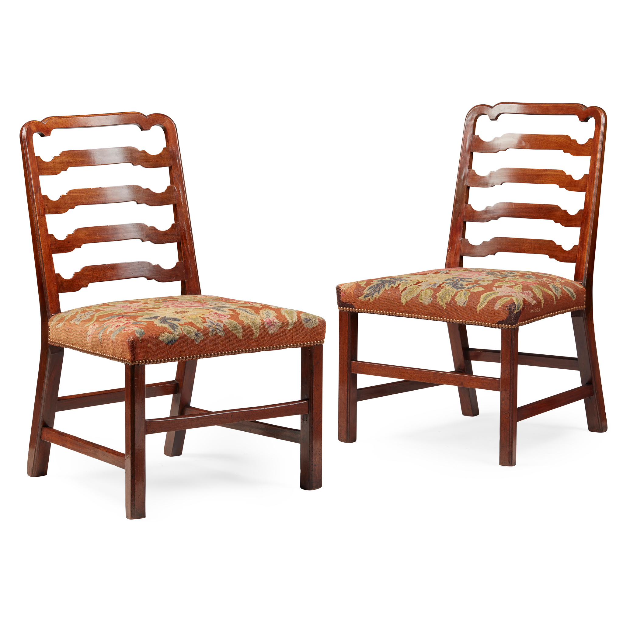 PAIR OF GEORGE III MAHOGANY LADDER BACK SIDE CHAIRS, IN THE MANNER OF GILES GRENDEY