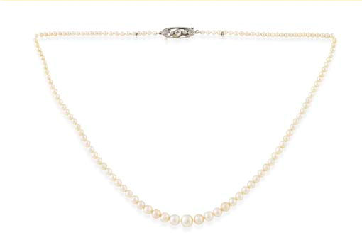A graduated natural pearl necklace with diamond set clasp
