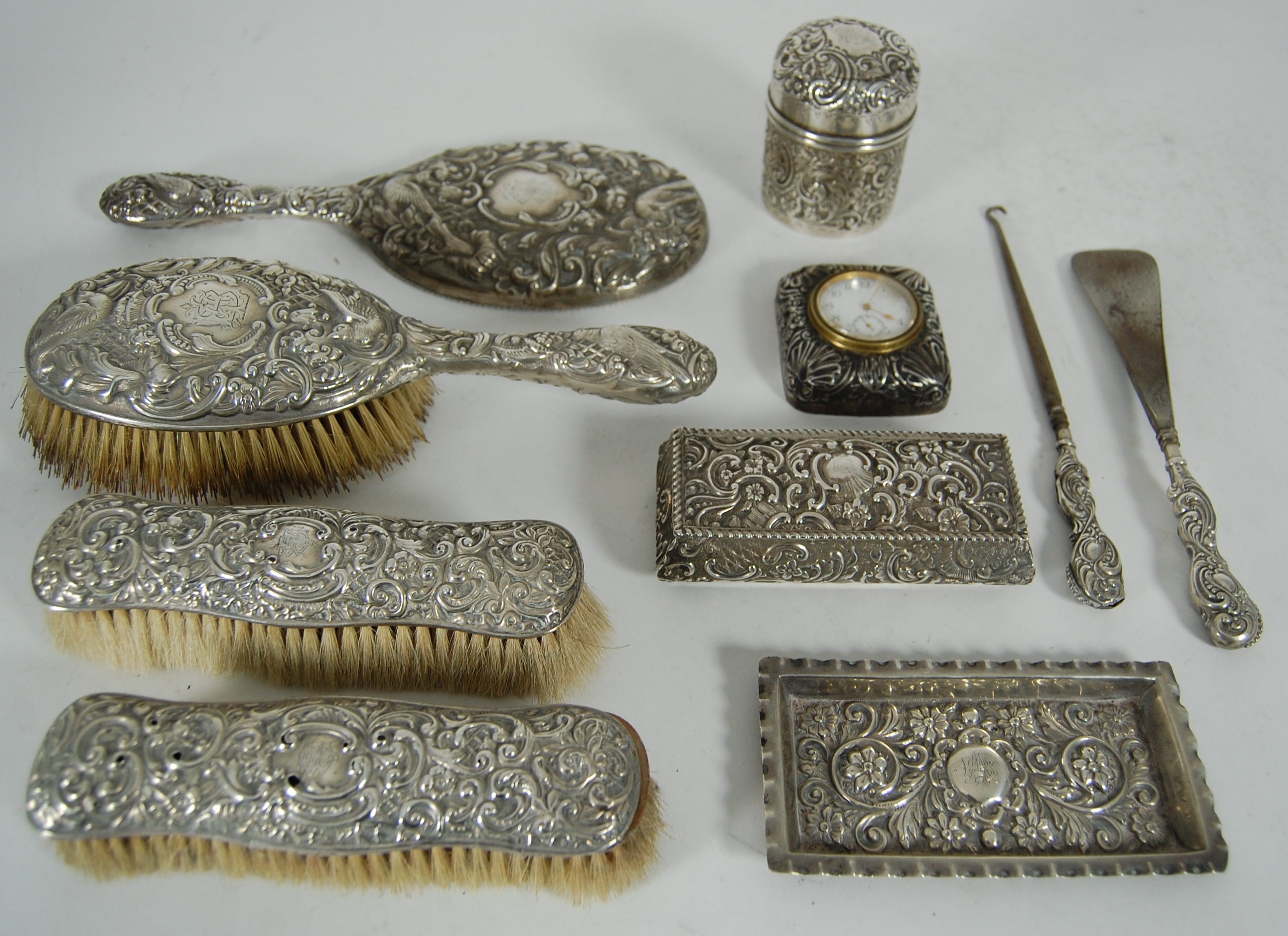 A matched dressing table set