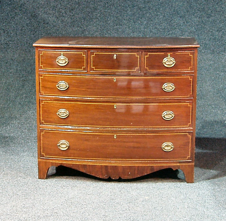 A Scottish George III mahogany and boxwood lined bowfront chest,