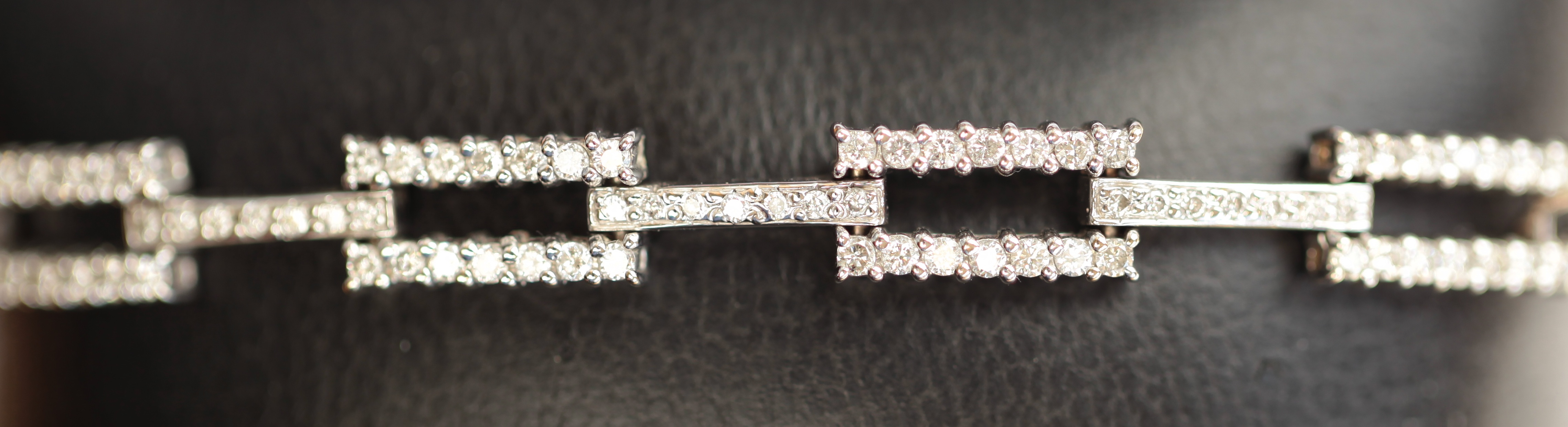 An 18ct white gold diamond set bracelet
