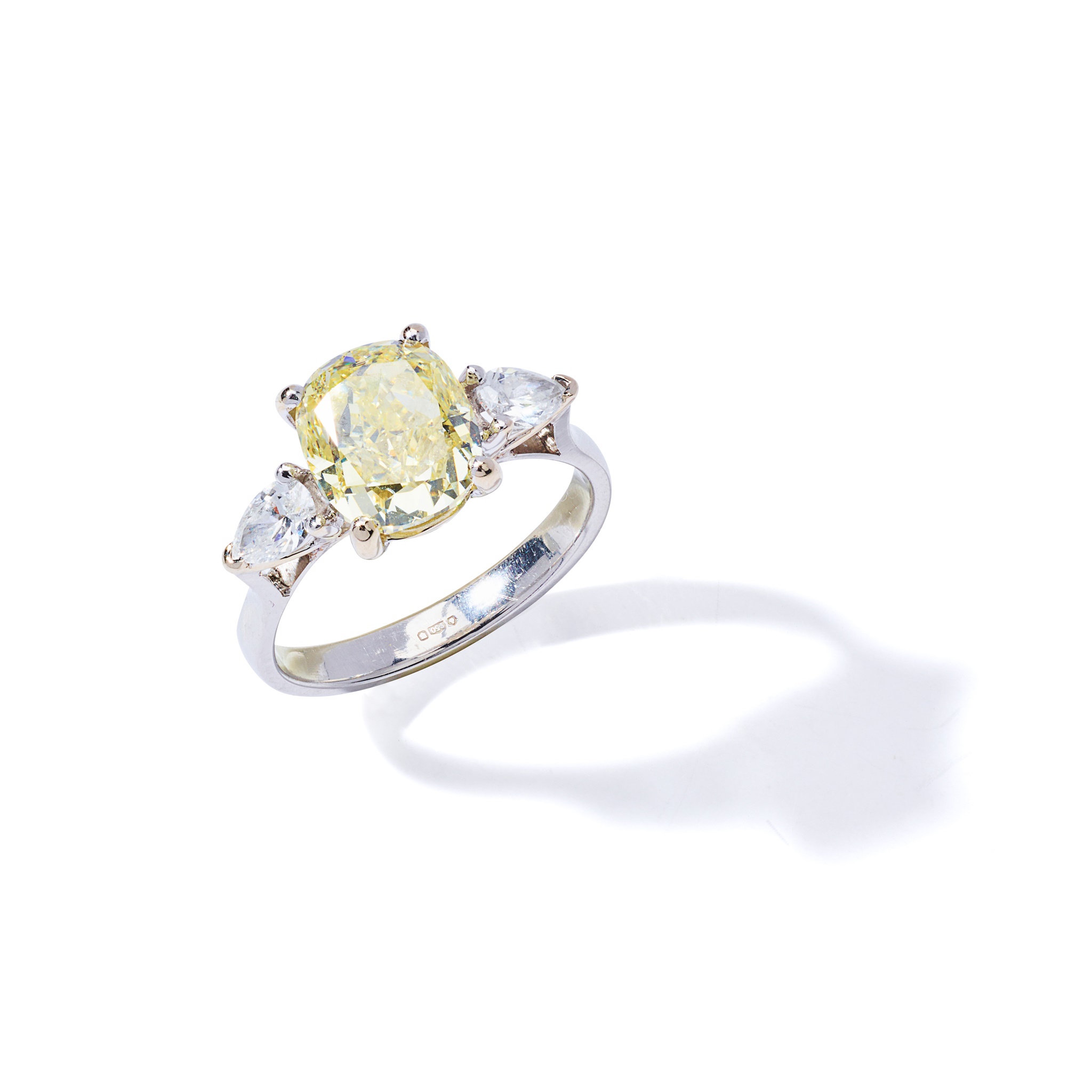 A fancy-coloured diamond ring