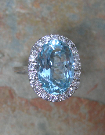 An aquamarine and diamond cluster ring,