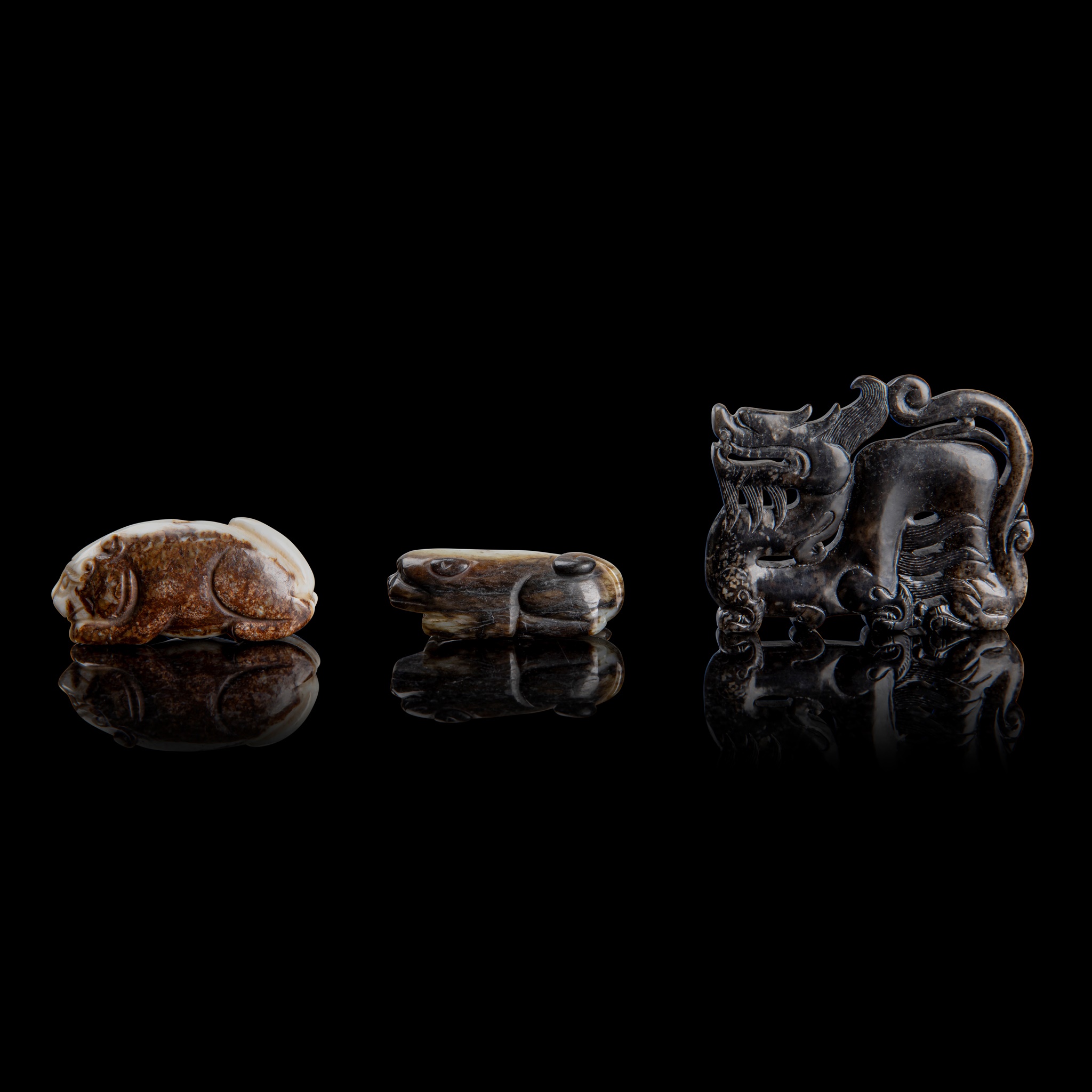 GROUP OF THREE JADE ANIMAL CARVINGS