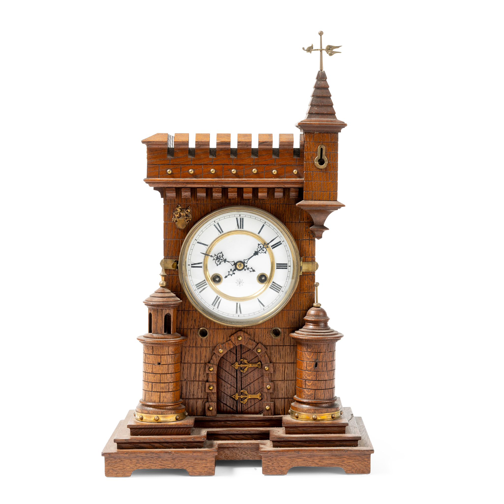 A LATE VICTORIAN OAK MANTEL CLOCK