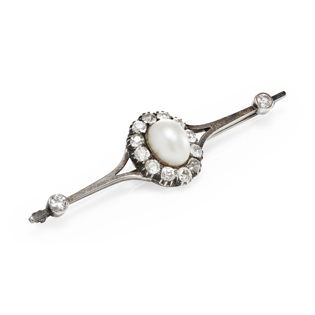 A natural pearl and diamond set brooch