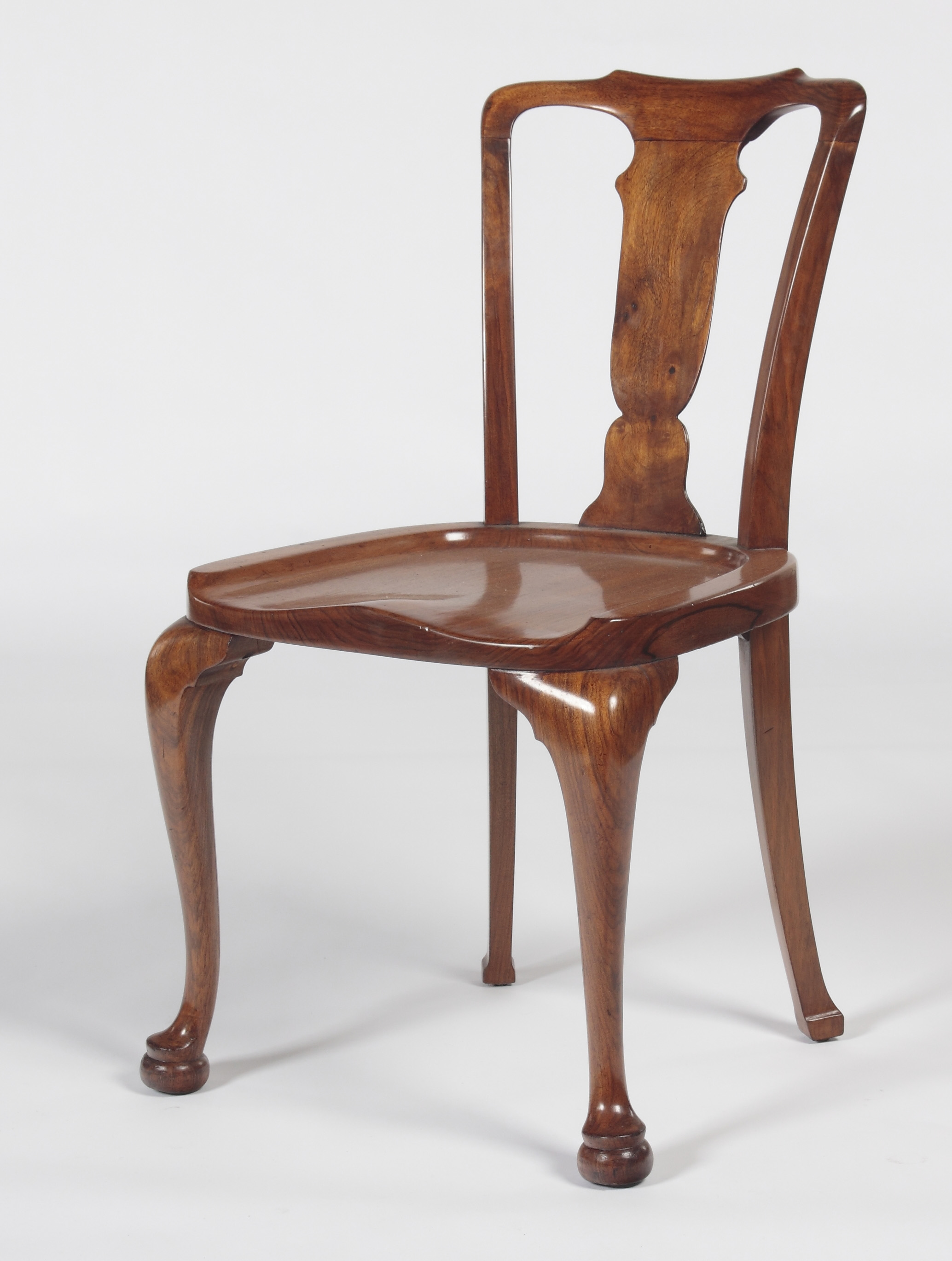 An early 20th century walnut desk chair Labeled 'Angus manufacturer's London, A.R.A'