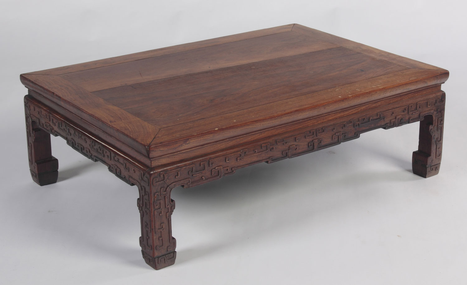 A 19th century Chinese carved hardwood low table
