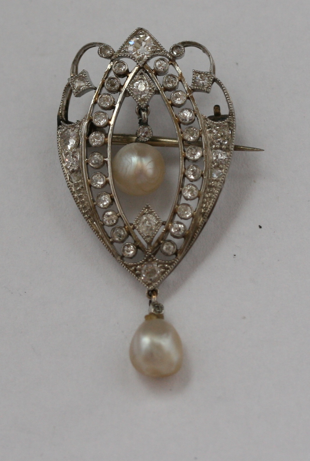 A Belle Epoque diamond and pearl brooch