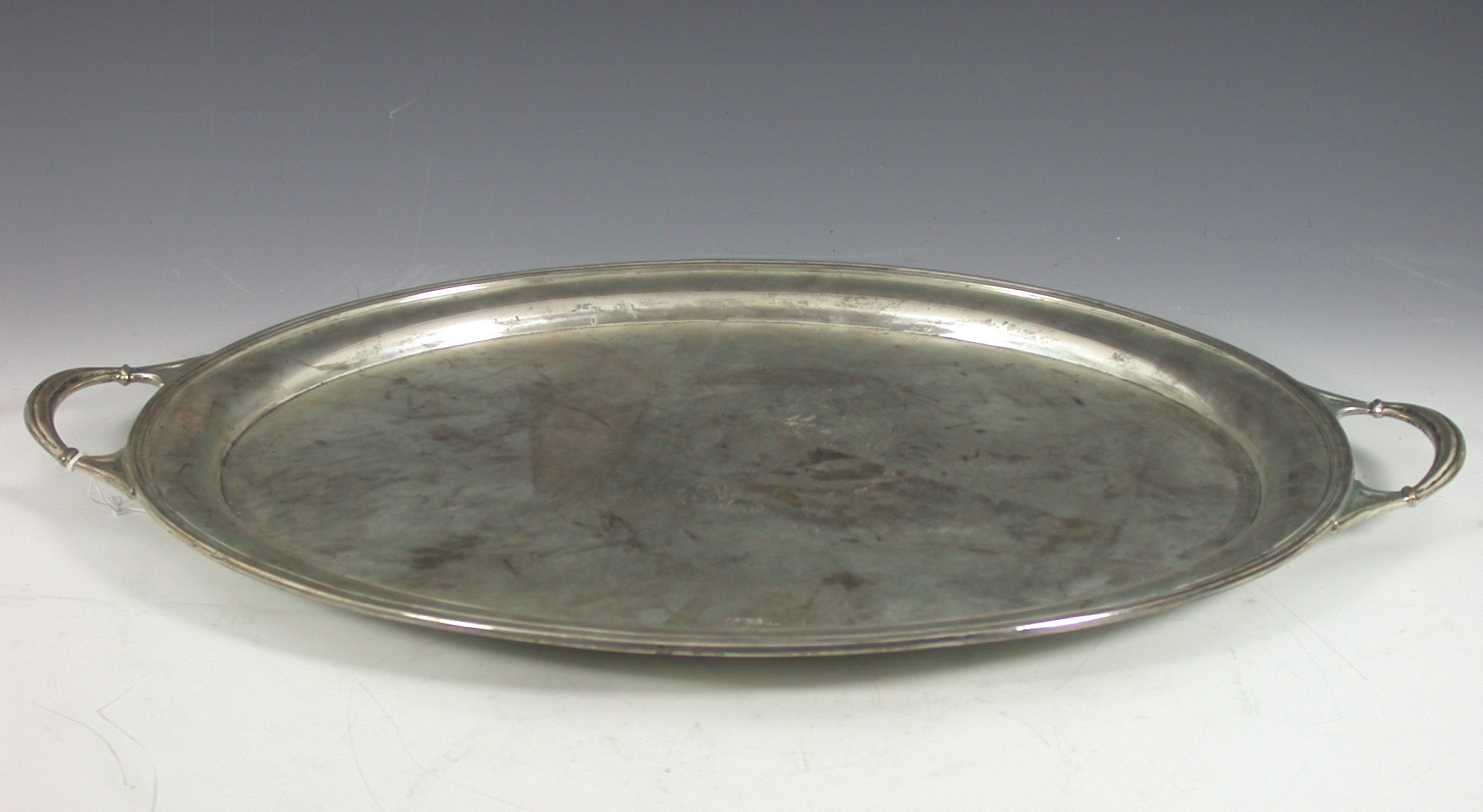 An Edwardian twin handled tray,