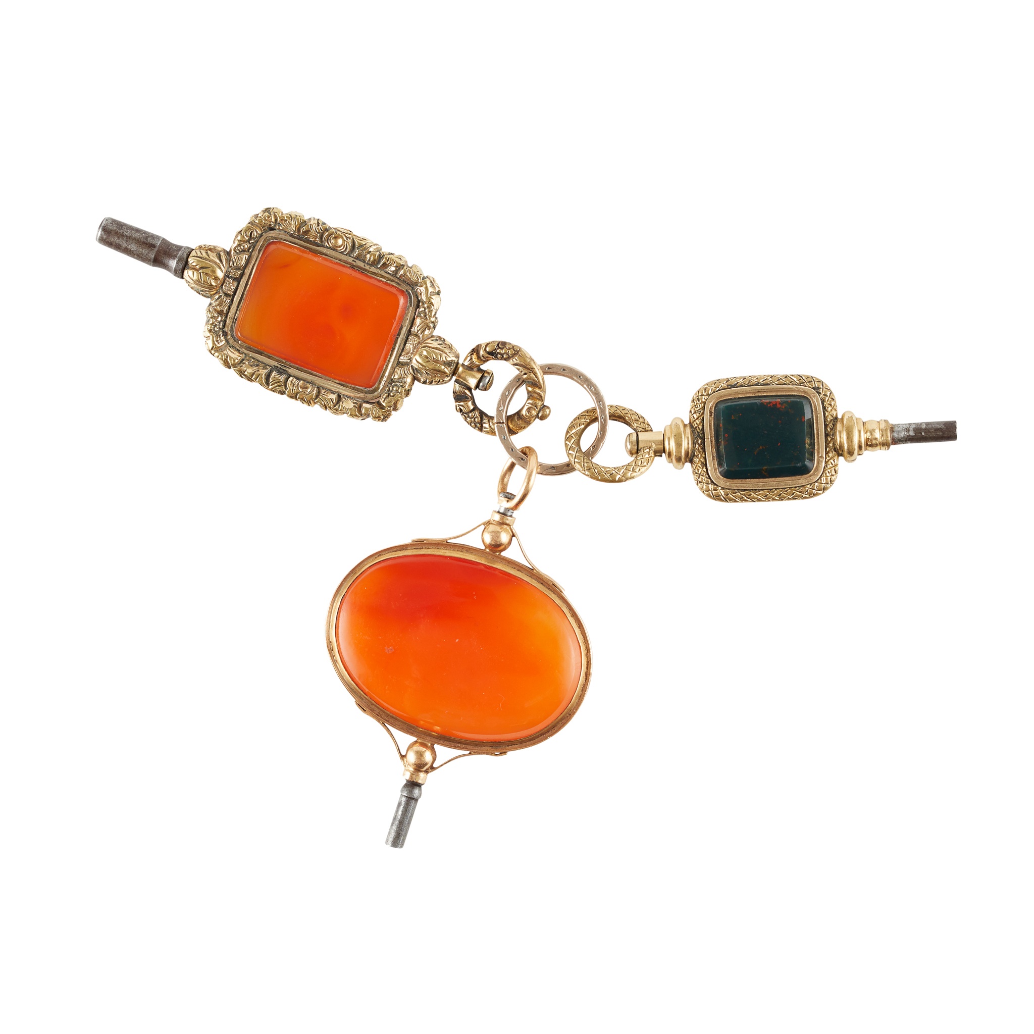A group of three early 19th century hard stone mounted watch keys